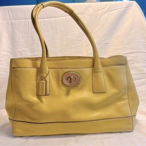 Coach yellow leather bag.